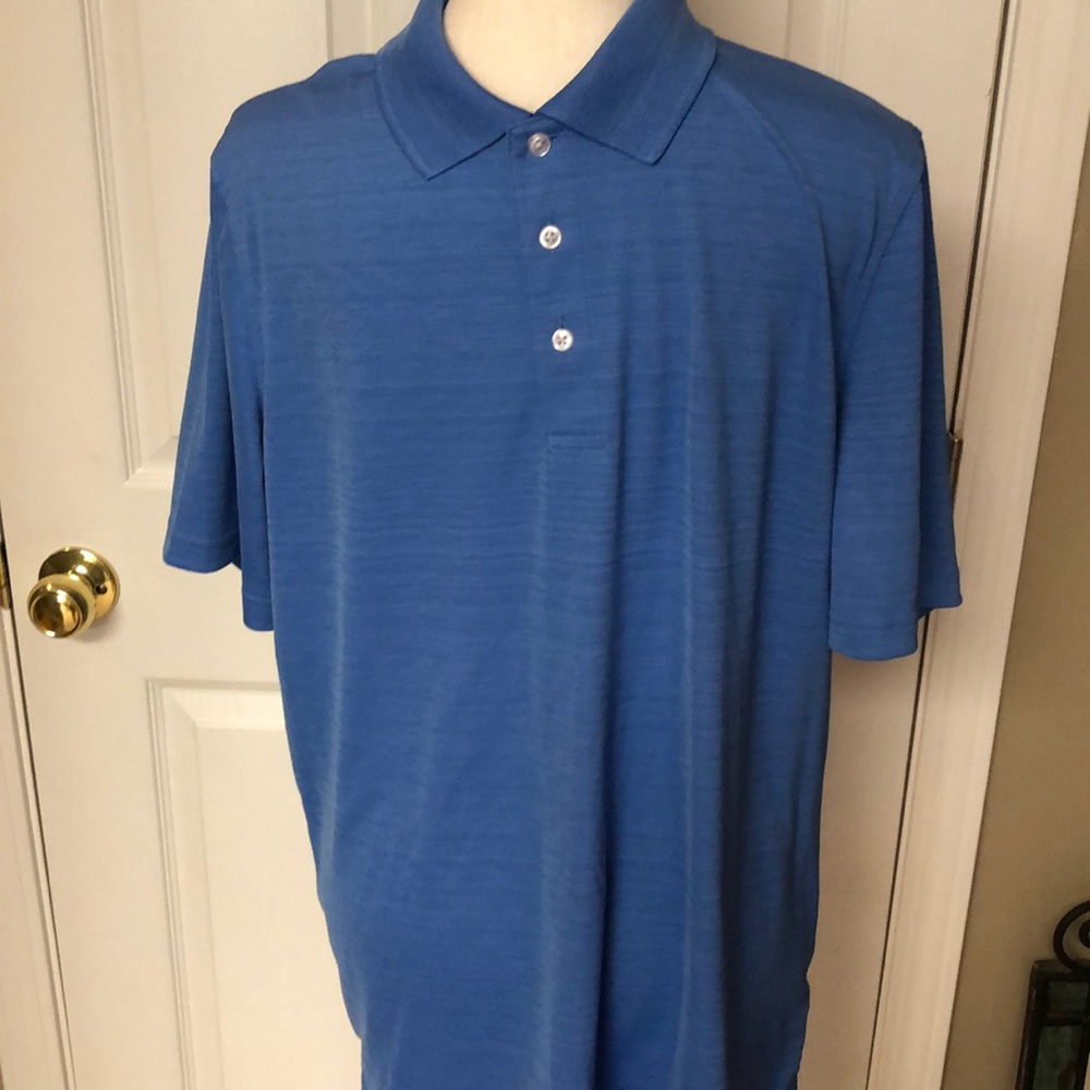 NWOT beautiful blue golf shirt. Slinky & soft